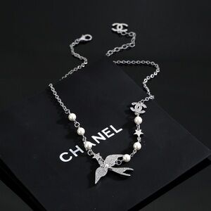 CHANEL Silver and Pearl Necklace with Bird Pendant